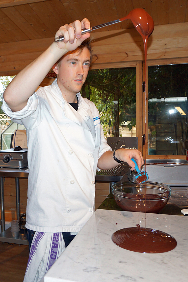James tempering hand made chocolate at J Cocoa